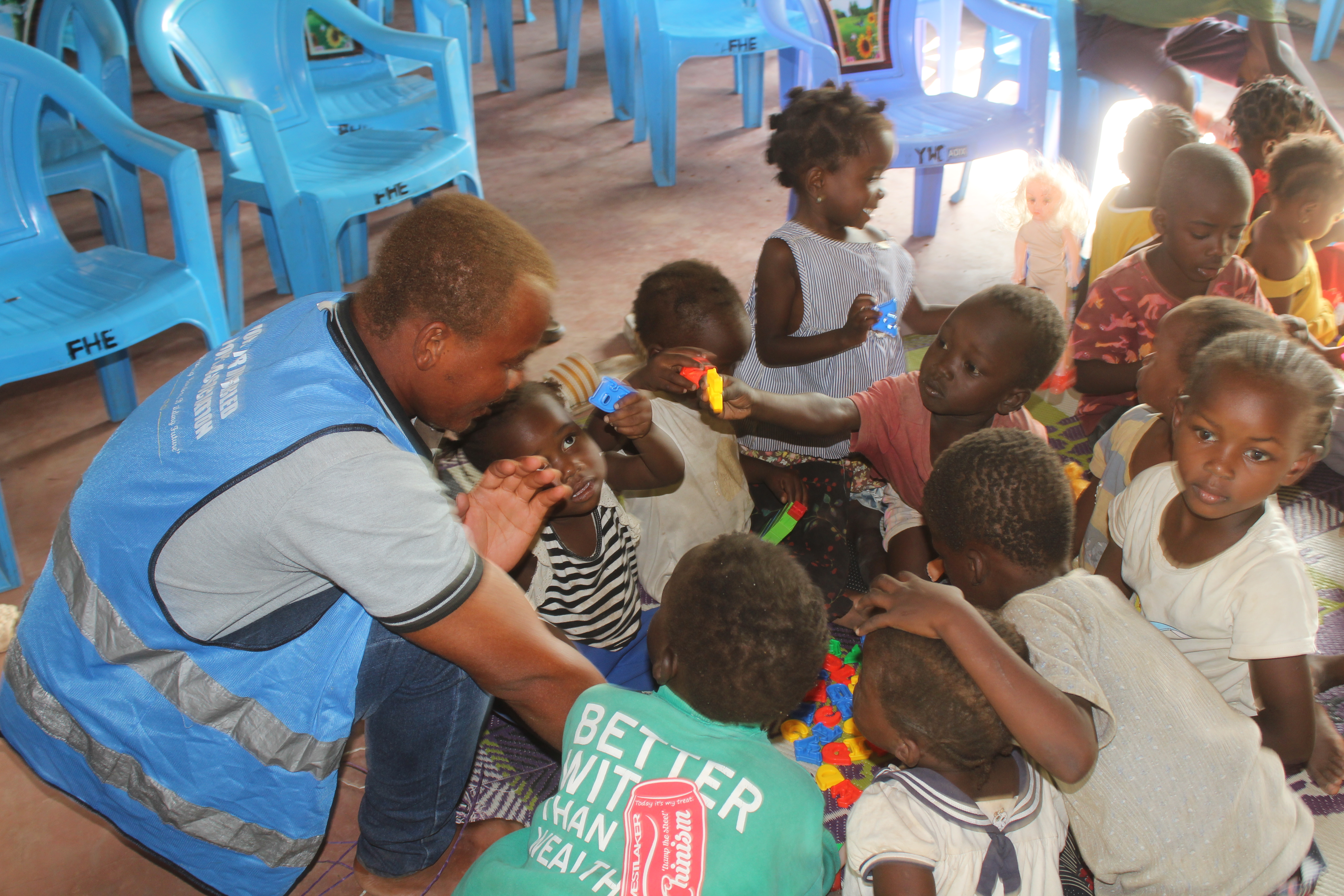 Volunteer holding tablet
